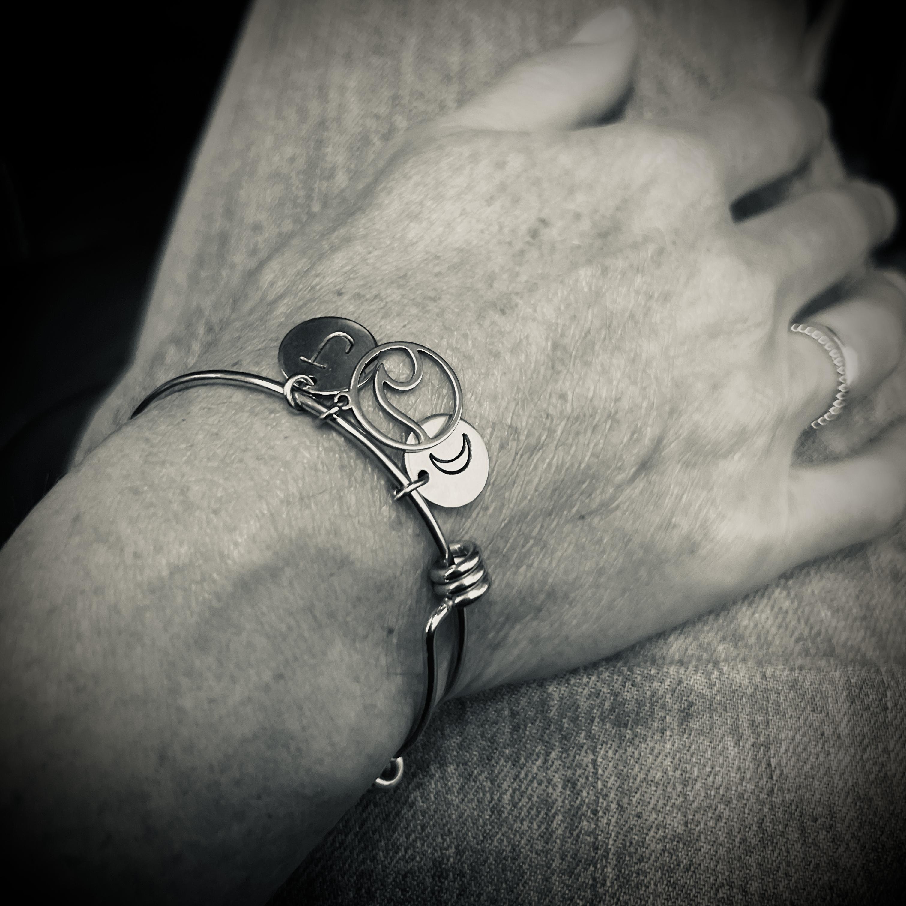 Julie’s bracelet made in Costa Rica. Each charm tells a story. Every story leads back to us. 🌙