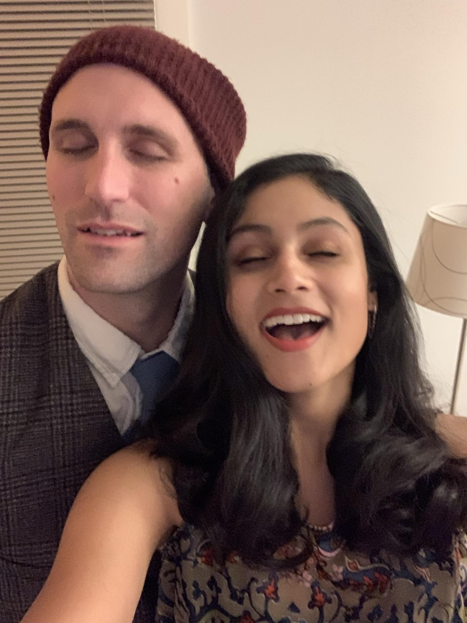 Daniel makes fun of Chandini because she can’t keep her eyes open for pictures.
