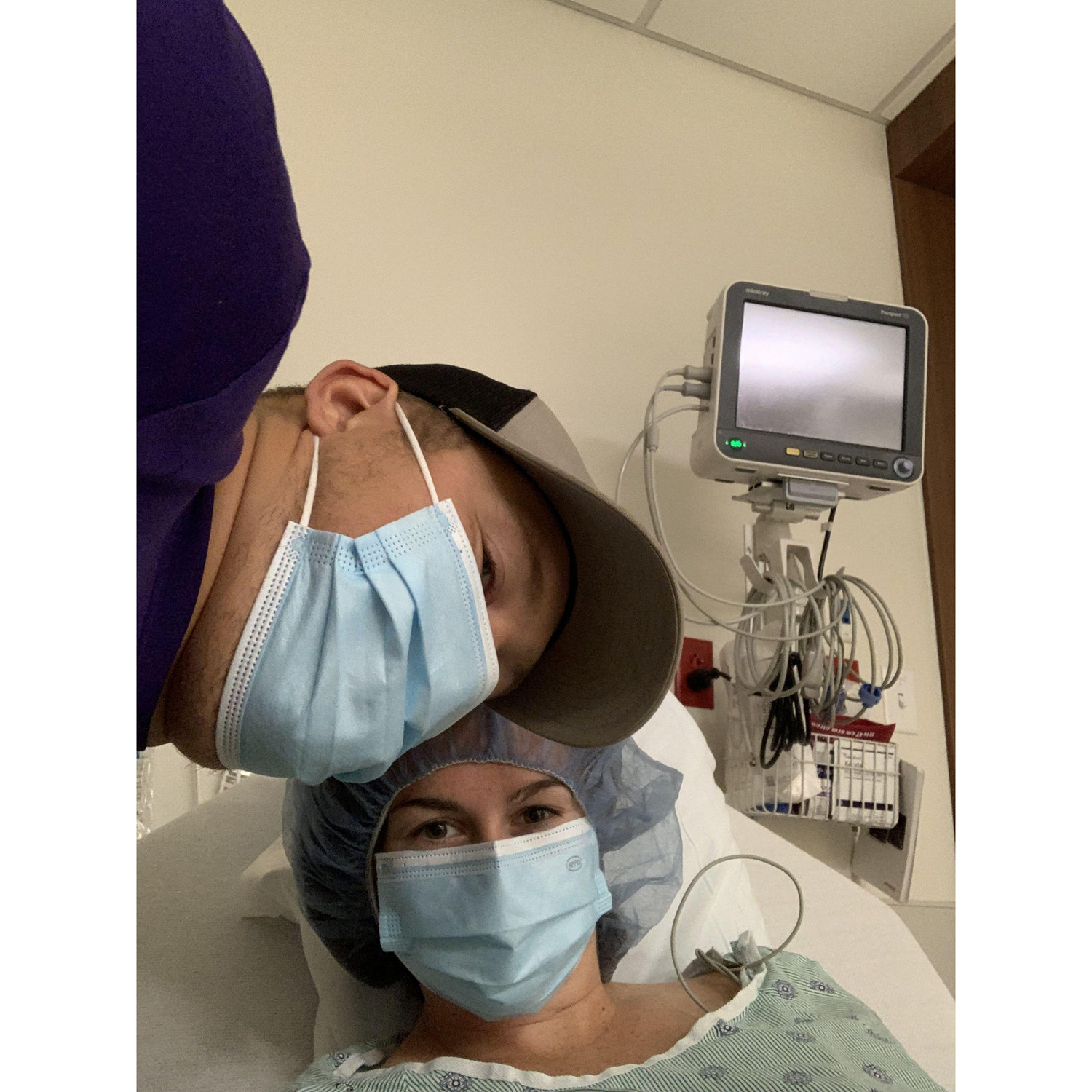 Kyle in the hospital with Allison before one of her knee surgeries