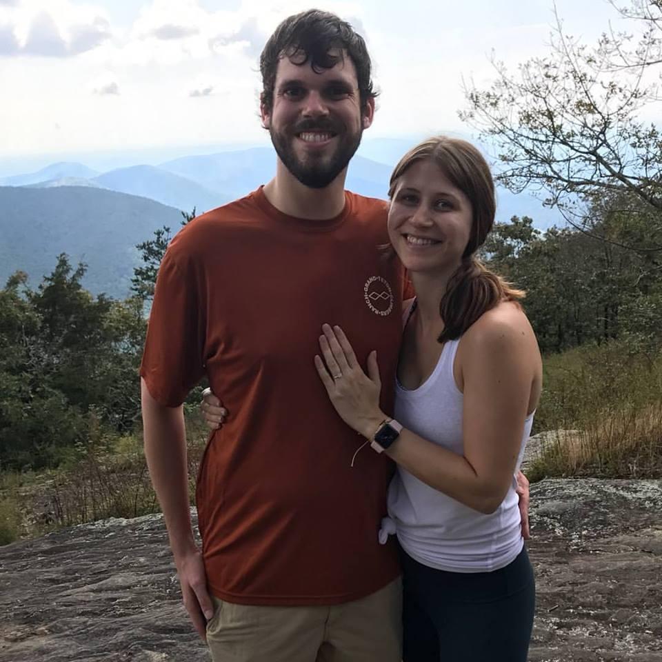 Freshly engaged standing on top of Cow Rock Mountain!