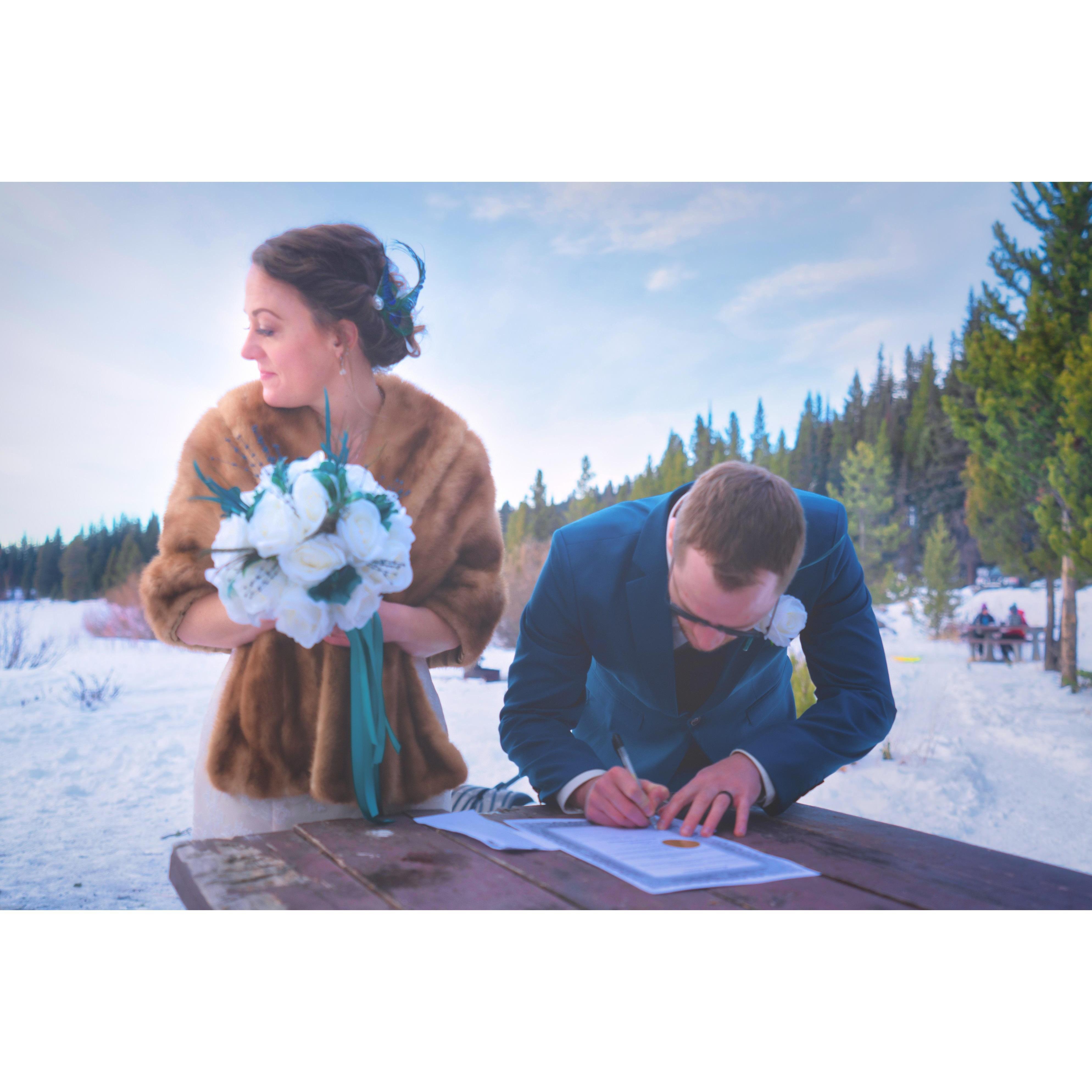 Colin signing the marriage license
