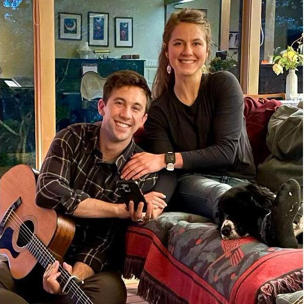 Playing music in Seattle with the little Charlie pup.