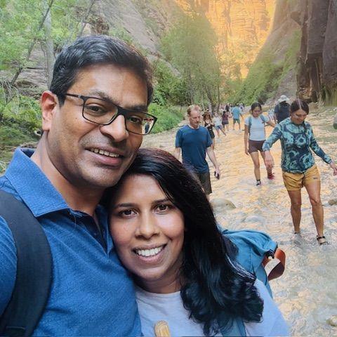 Hiking through the iconic Narrows at Zion National Park.