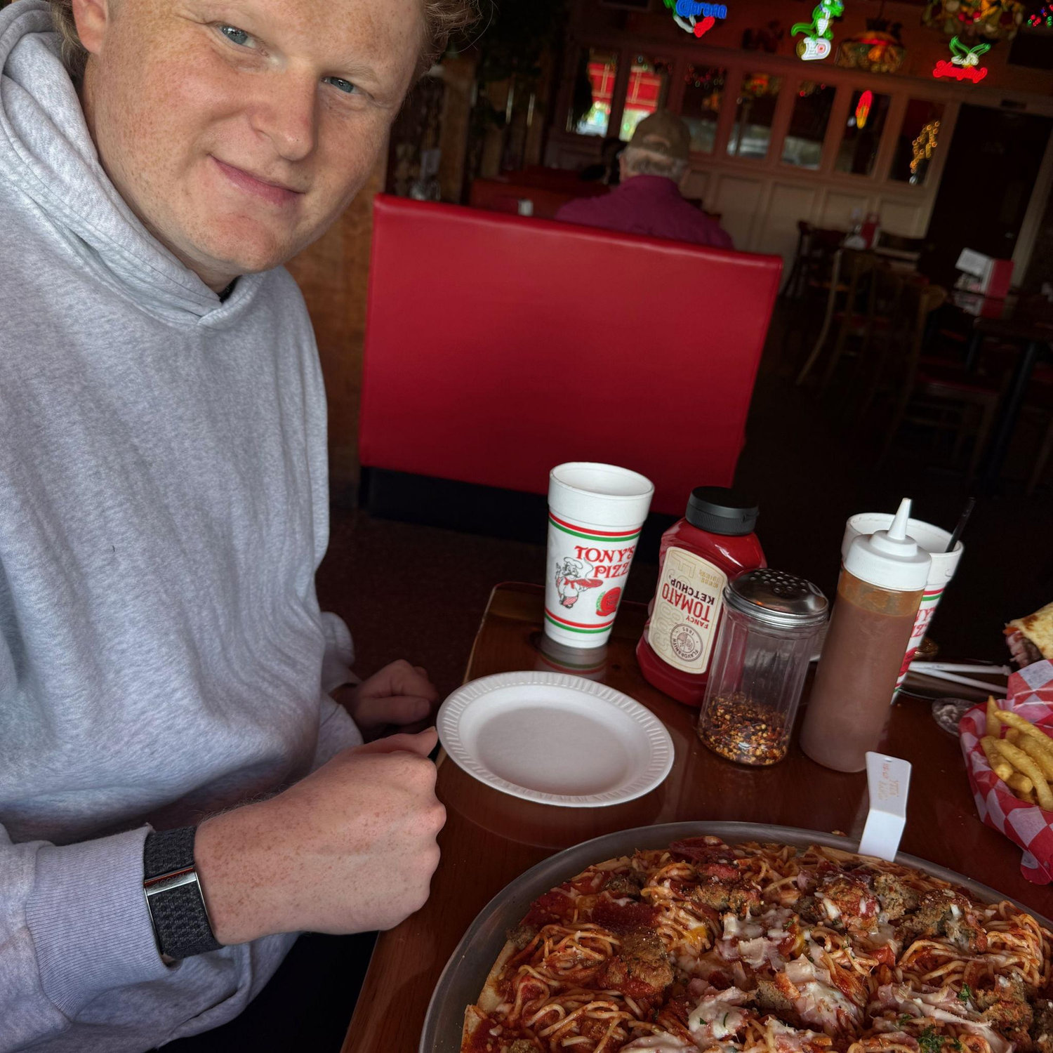 November 2025: Dallas' first spaghetti pizza from Tony's in Lake Charles. This is one of Anna's favorite meals, but Dallas was not too sure about it.