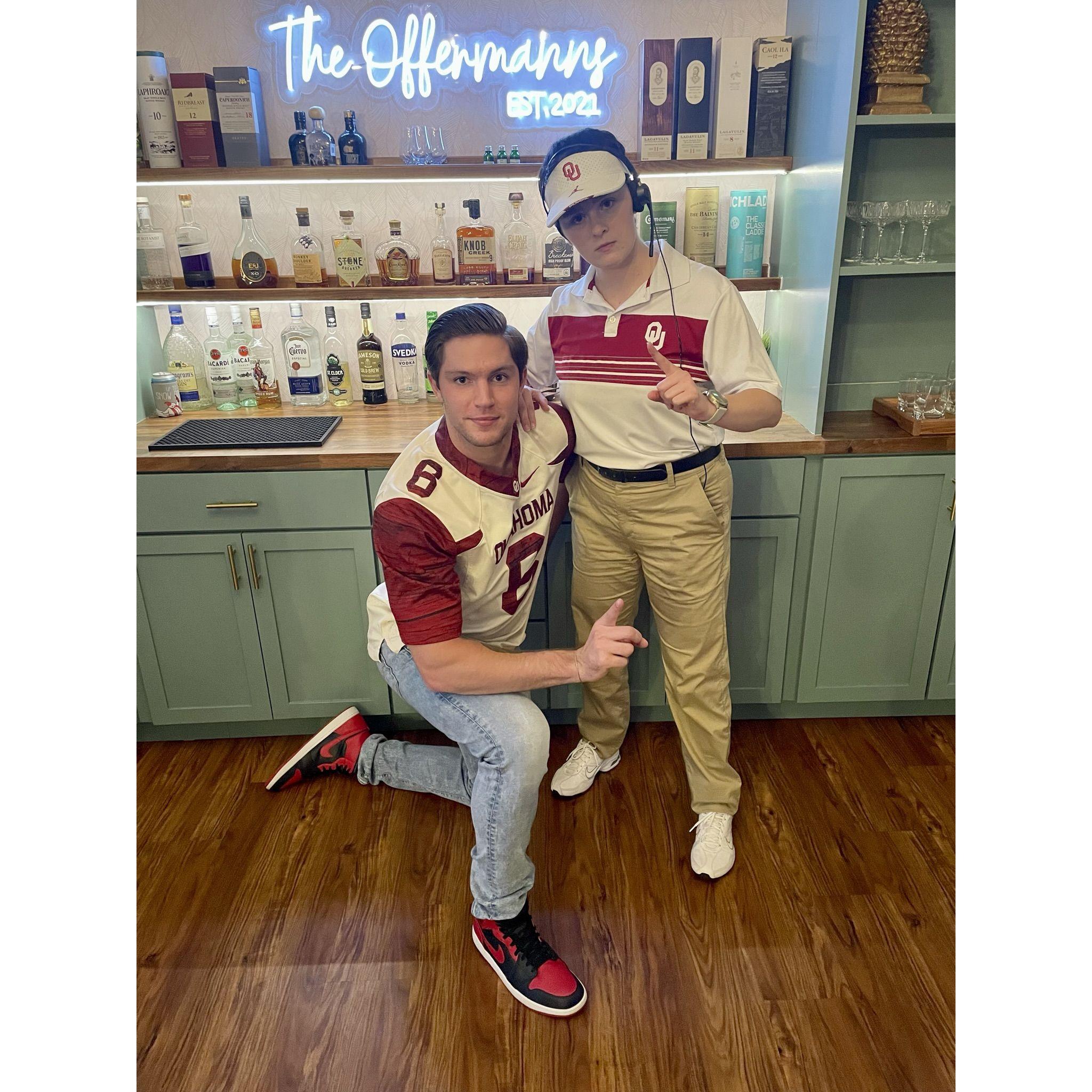 At a party where everybody dressed as something that starts with "B" (Brendan: Baker Mayfield, Regan: Bob Stoops)