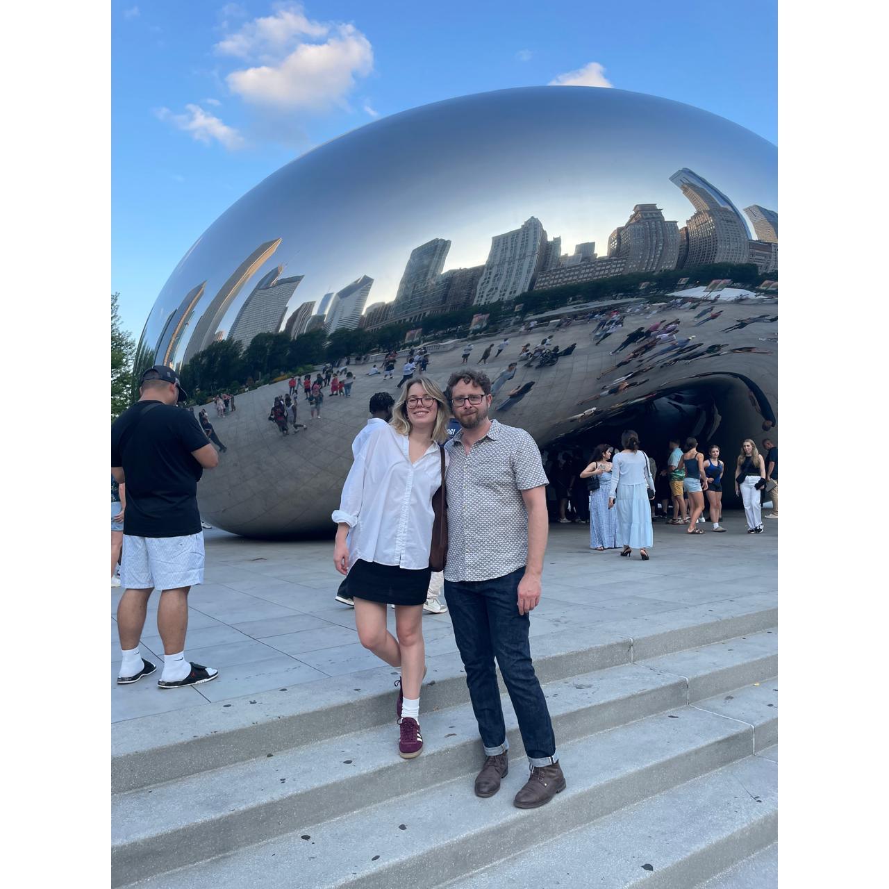 Julia forcing Dan to take a picture in front a giant bean.