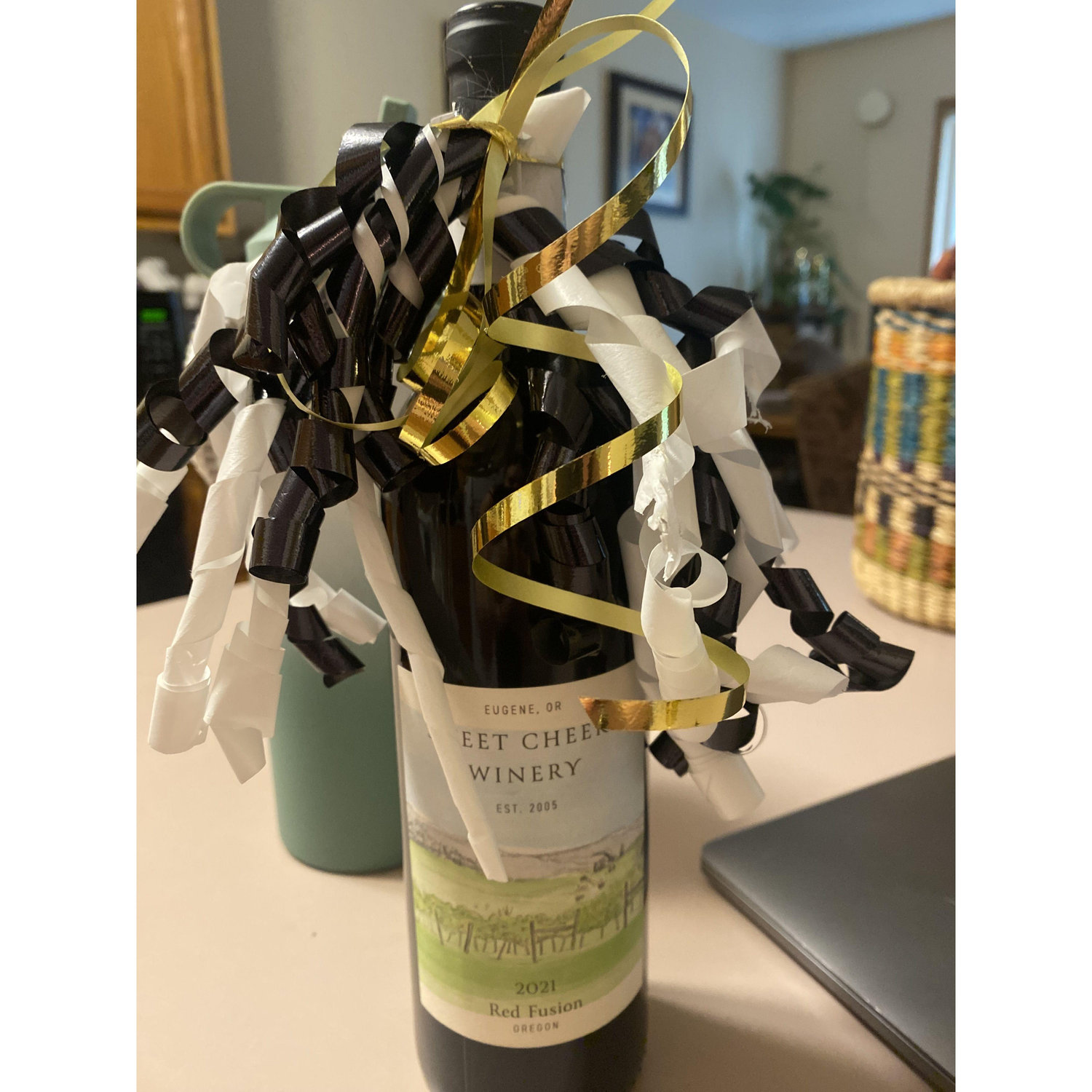 We announced our venue location by gifting our parents a bottle of Sweet Cheeks wine