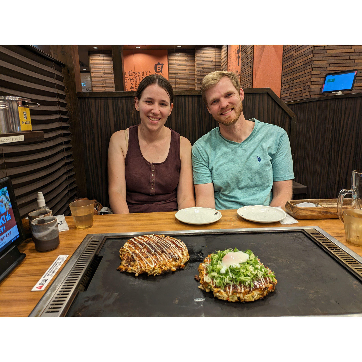 Okonomiyaki was the first thing Trevor made for Natasha. Here they are eating it together in Japan!