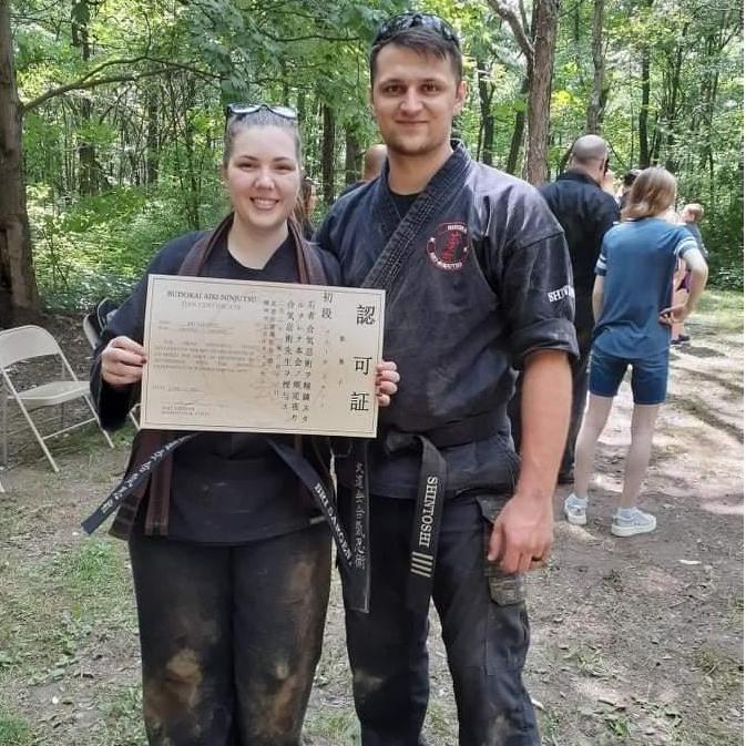 Bri earned her black belt with Josiah by her side every step of the way!