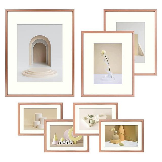 Frametory, Aluminum Picture Frames Set of 7 - Rose Gold Gallery Wall Kit - Displays One 11x14, Two 8x10, and Four 5x7 inch Photos for Home Decoration