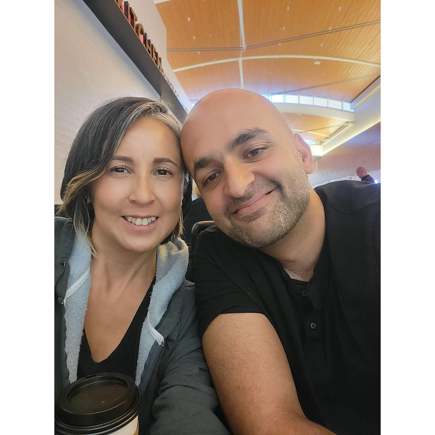 Us at the airport for our first trip together. We were headed to New York to meet his family.