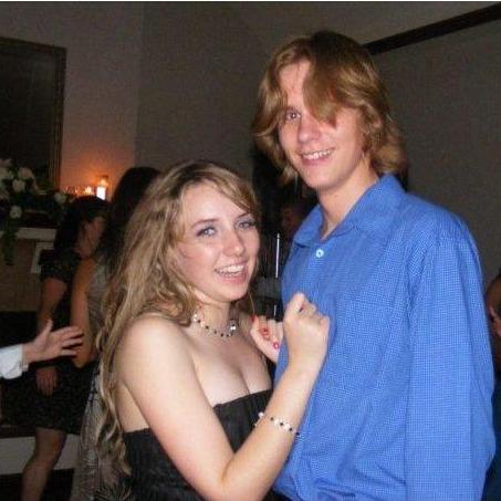 The oldest photo we have together! We were one month into dating and I was already her +1 for her aunt's wedding.