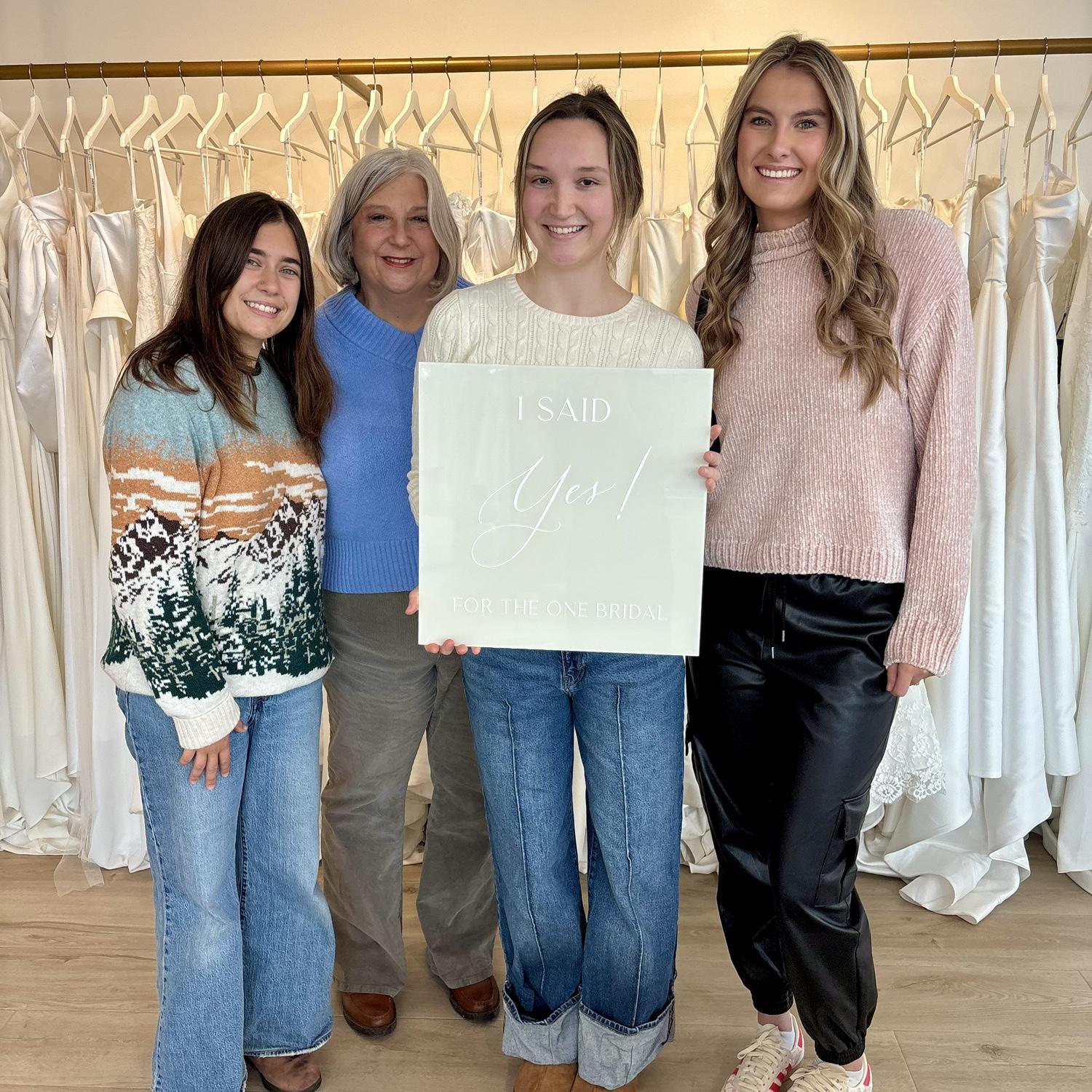 Maya (officiant), Amy (mother of the bride), and Ali (maid of honor) with Abby when she said yes to the dress!