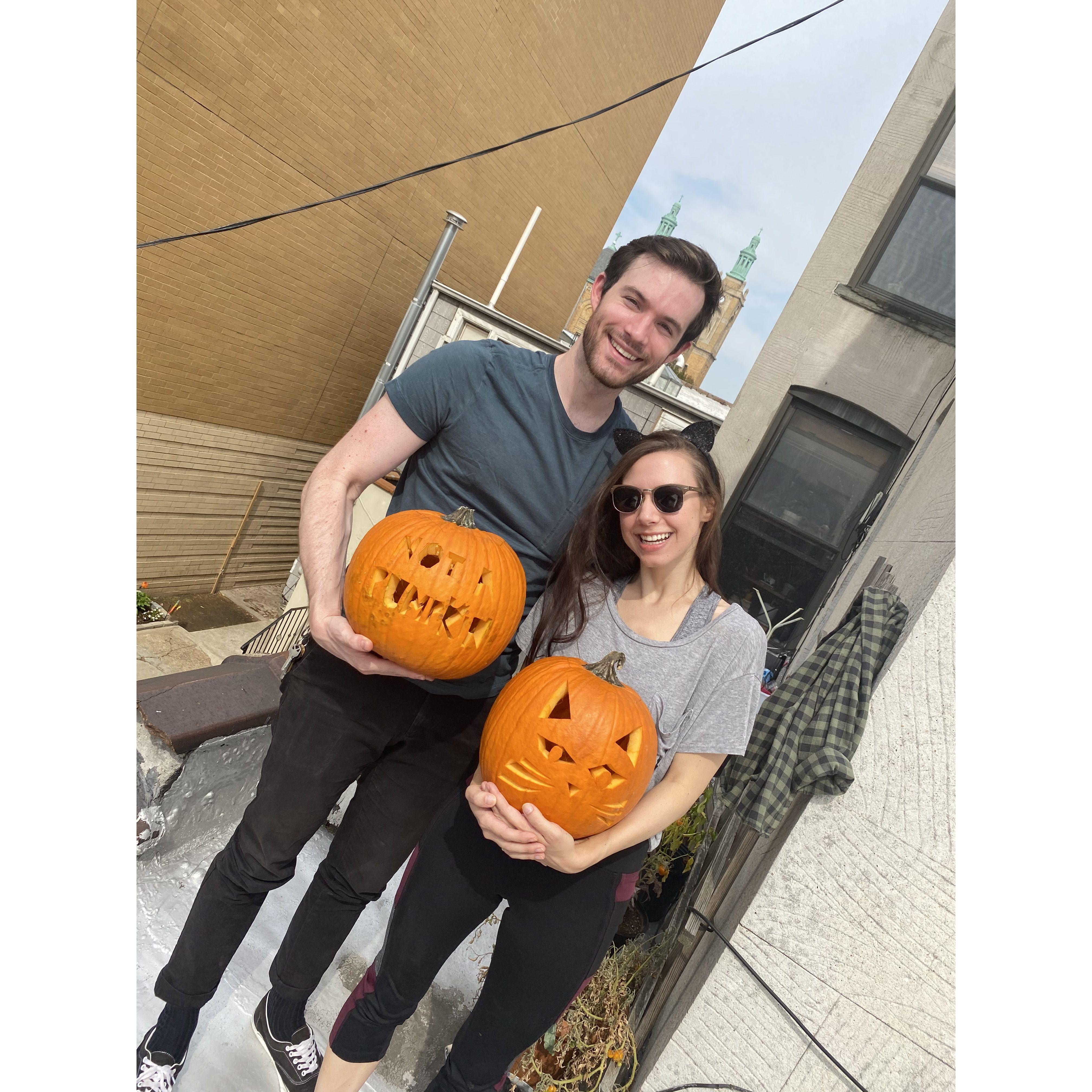 Carving pumpkins on our friend's roof, Halloween 2020