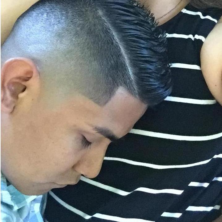 Alejandro sleeping in Janie's abrazos