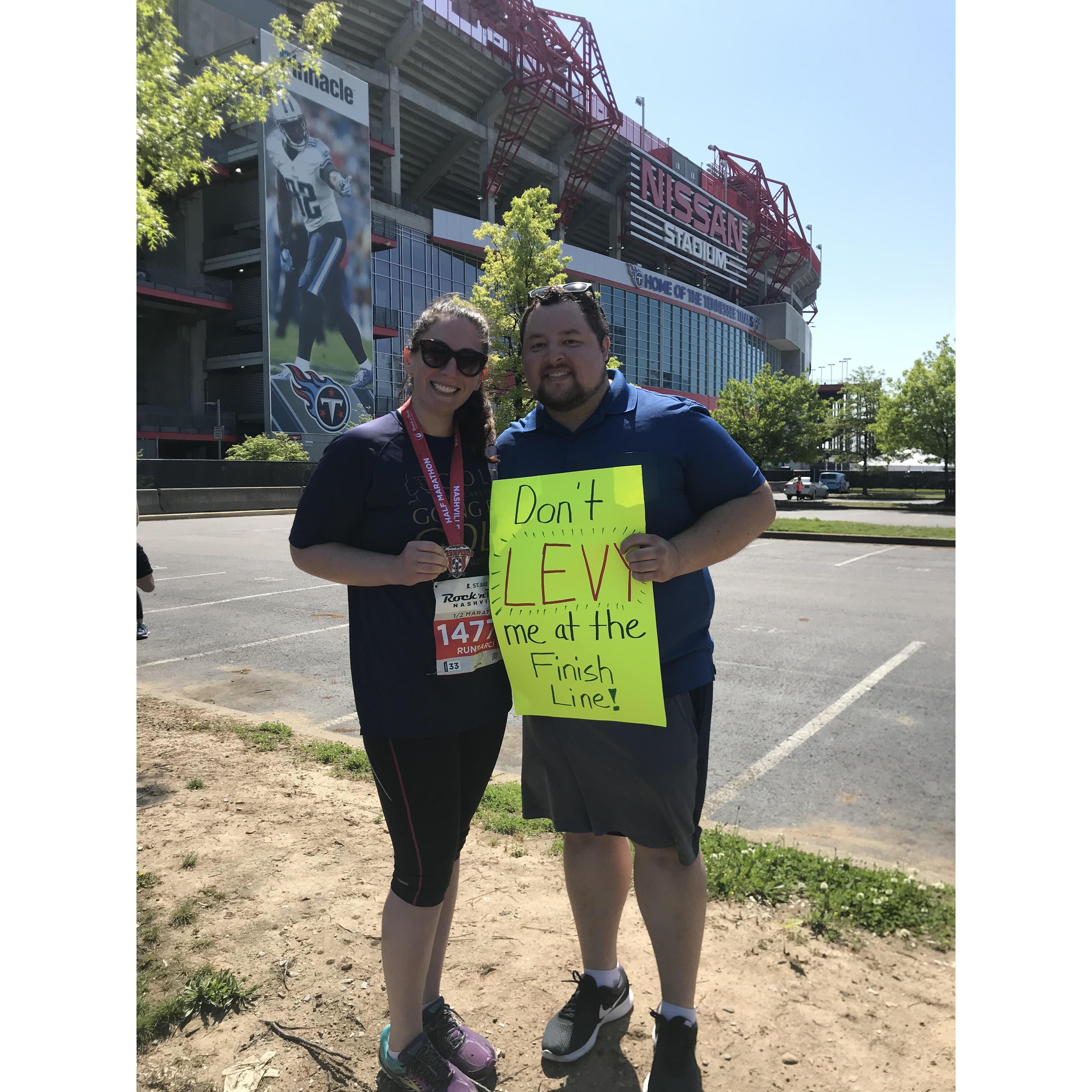 Jacob being the best cheerleader to Marci running a half marathon