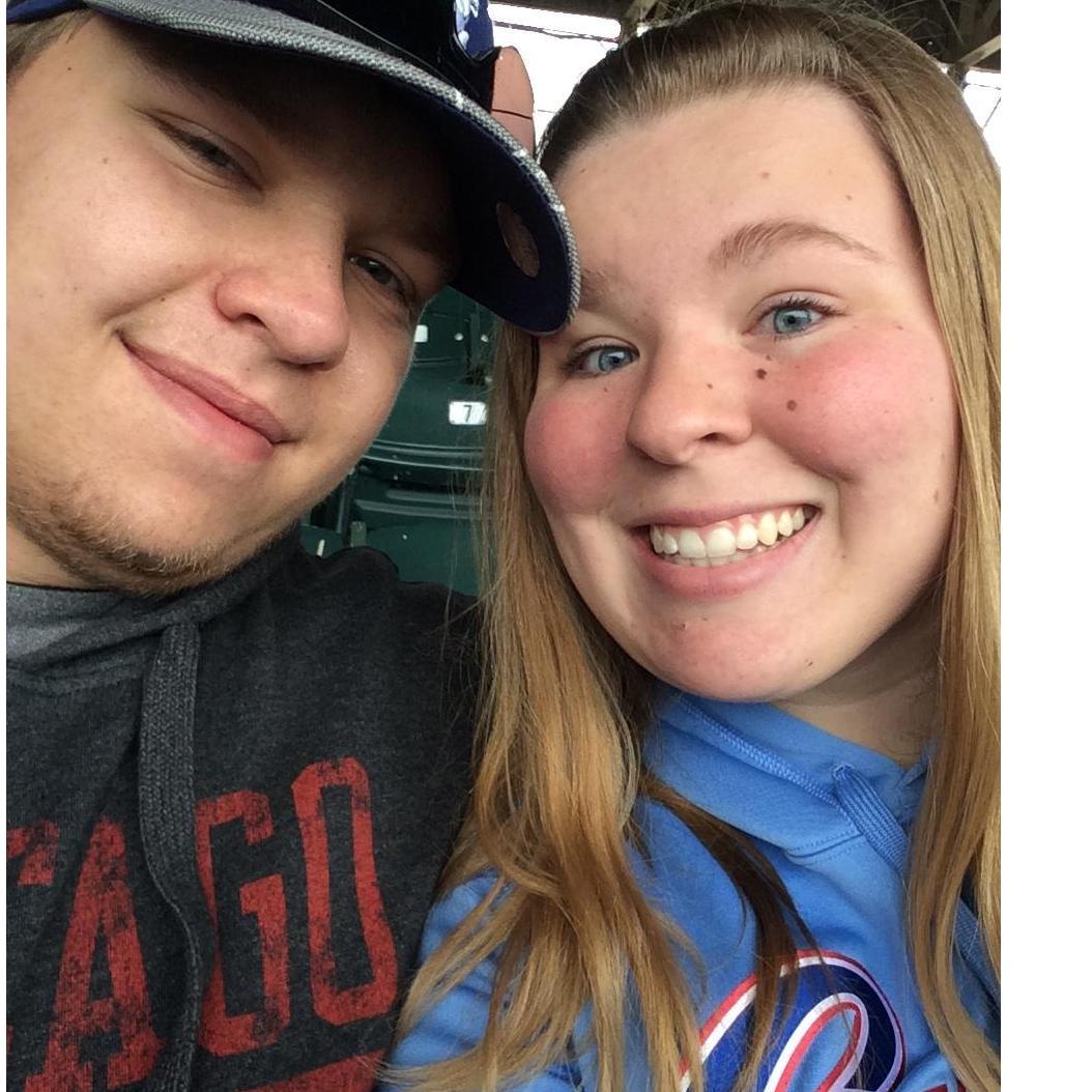 One of our many pictures doing what we love - Watching the Cubbies at Wrigley!