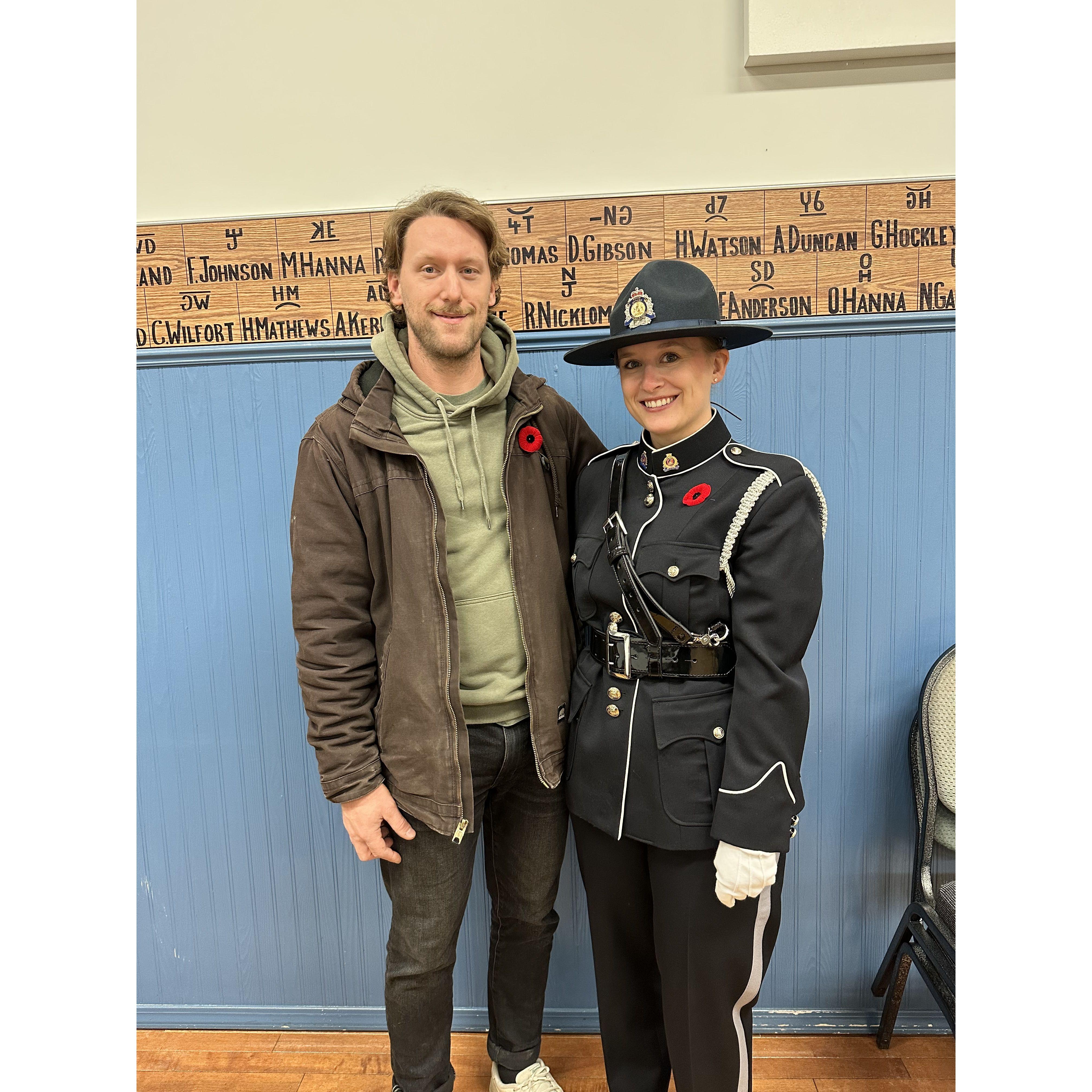 He likes a gal in uniform...