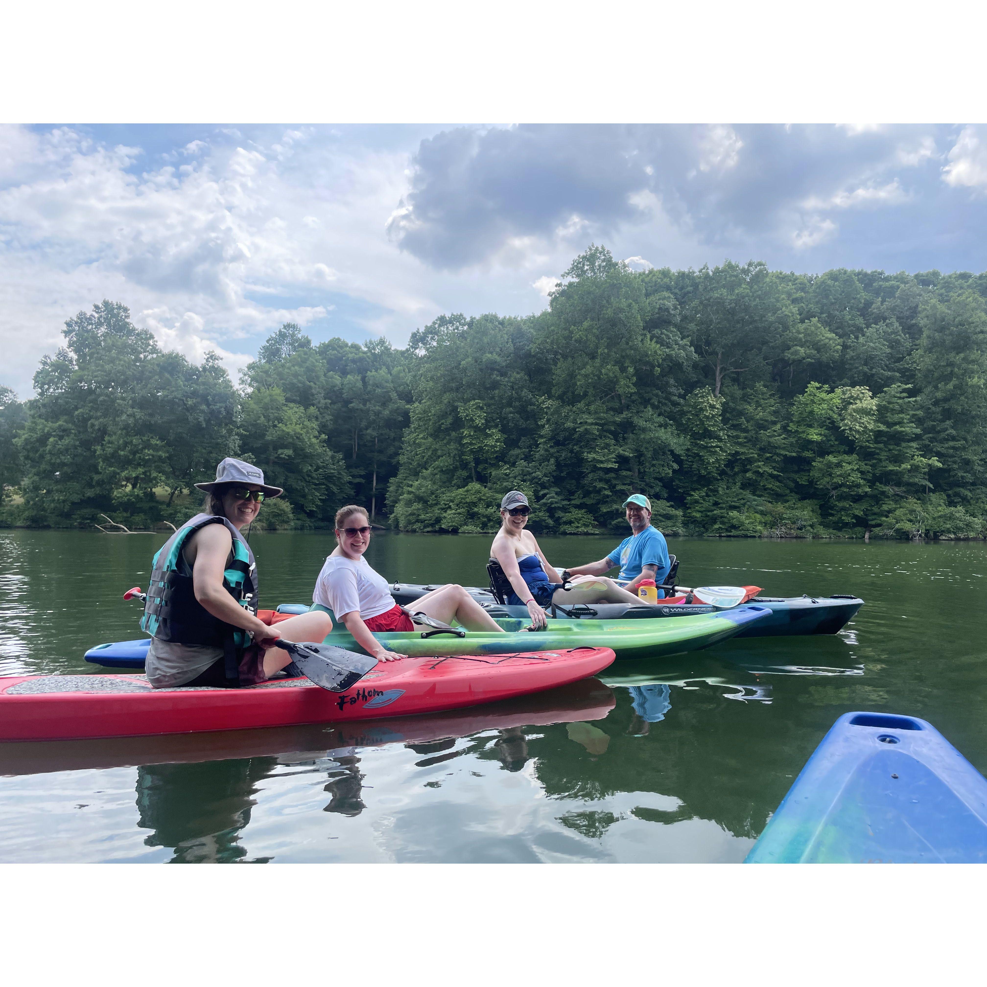 Kayaking with the sibs during our Sibling Cabin Trip, summer 2022.