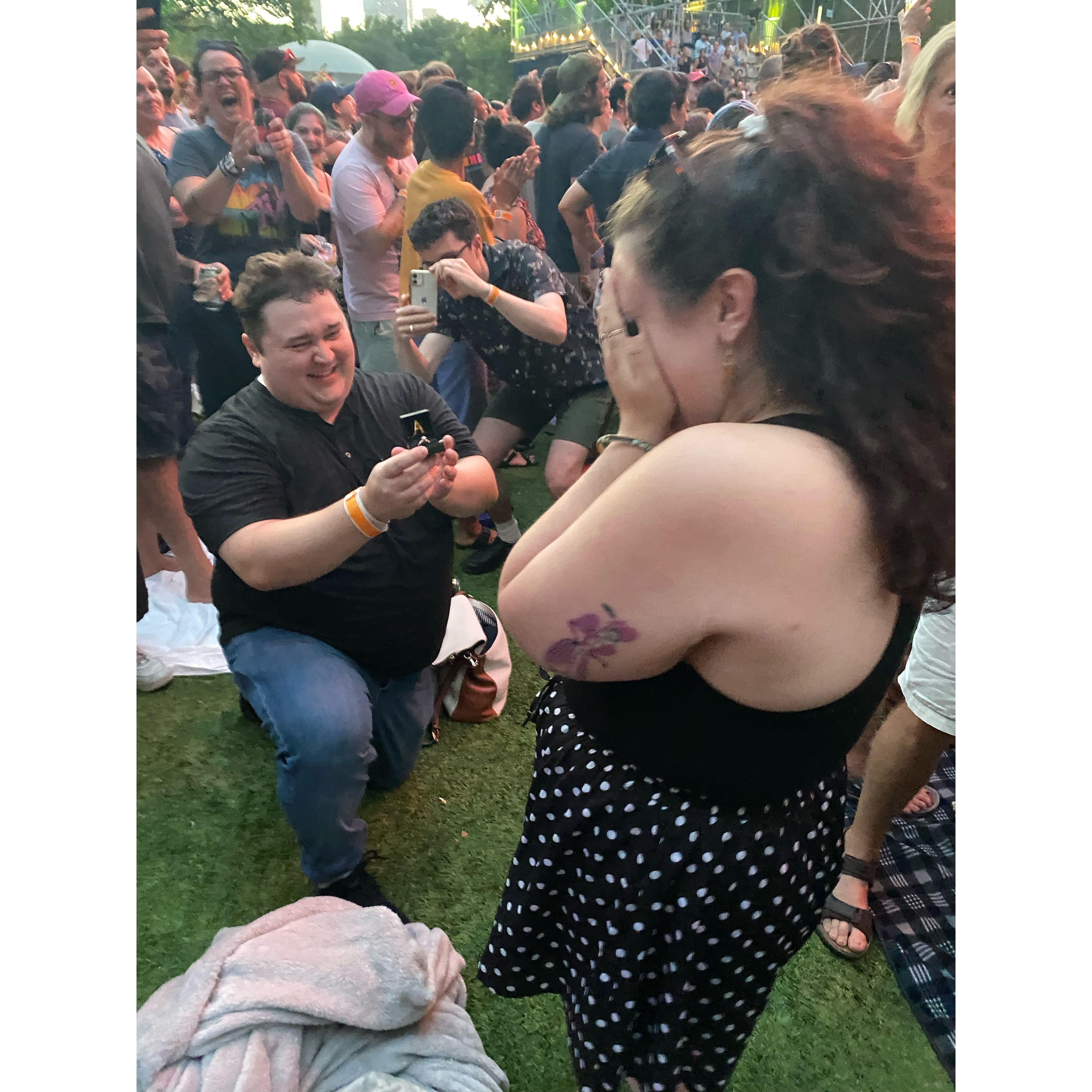 He popped the question....and she said yes!