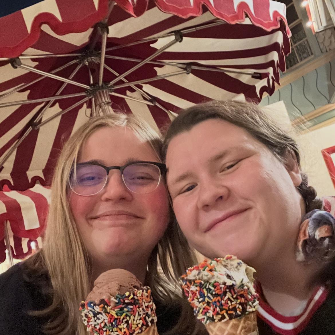 Sharing a quick ice cream treat before watching the nightly parade down Main Street in Disneyland.