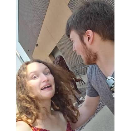 We got chased by the raptor at Angela's school the day we started officially dating.