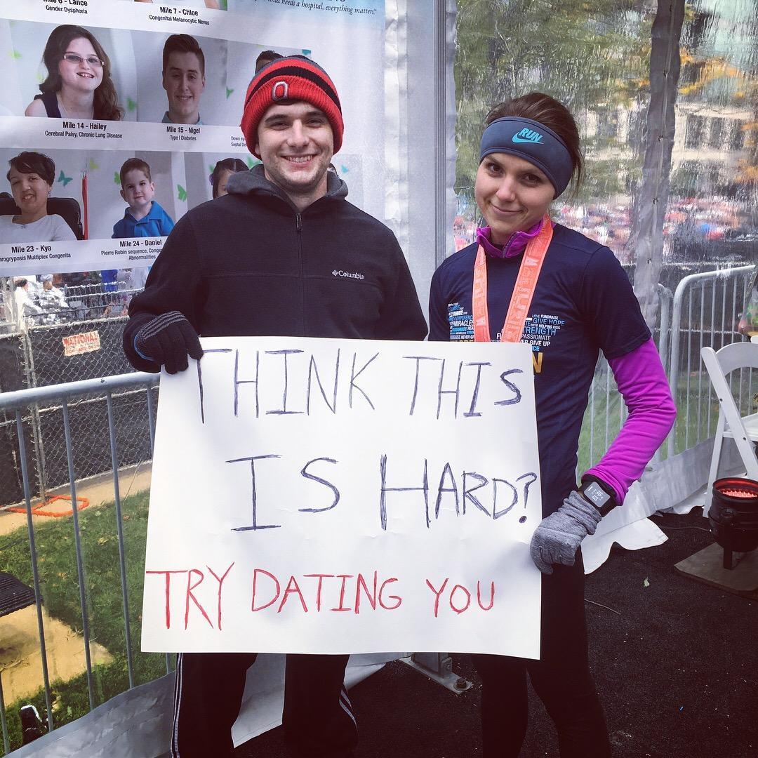 Matt loves waking up early to cheer Kelsey on for her half marathons