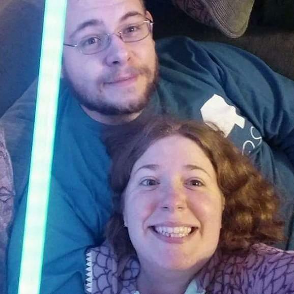 When Dain and I lived in Buffalo, us with my lightsaber I got for Christmas
