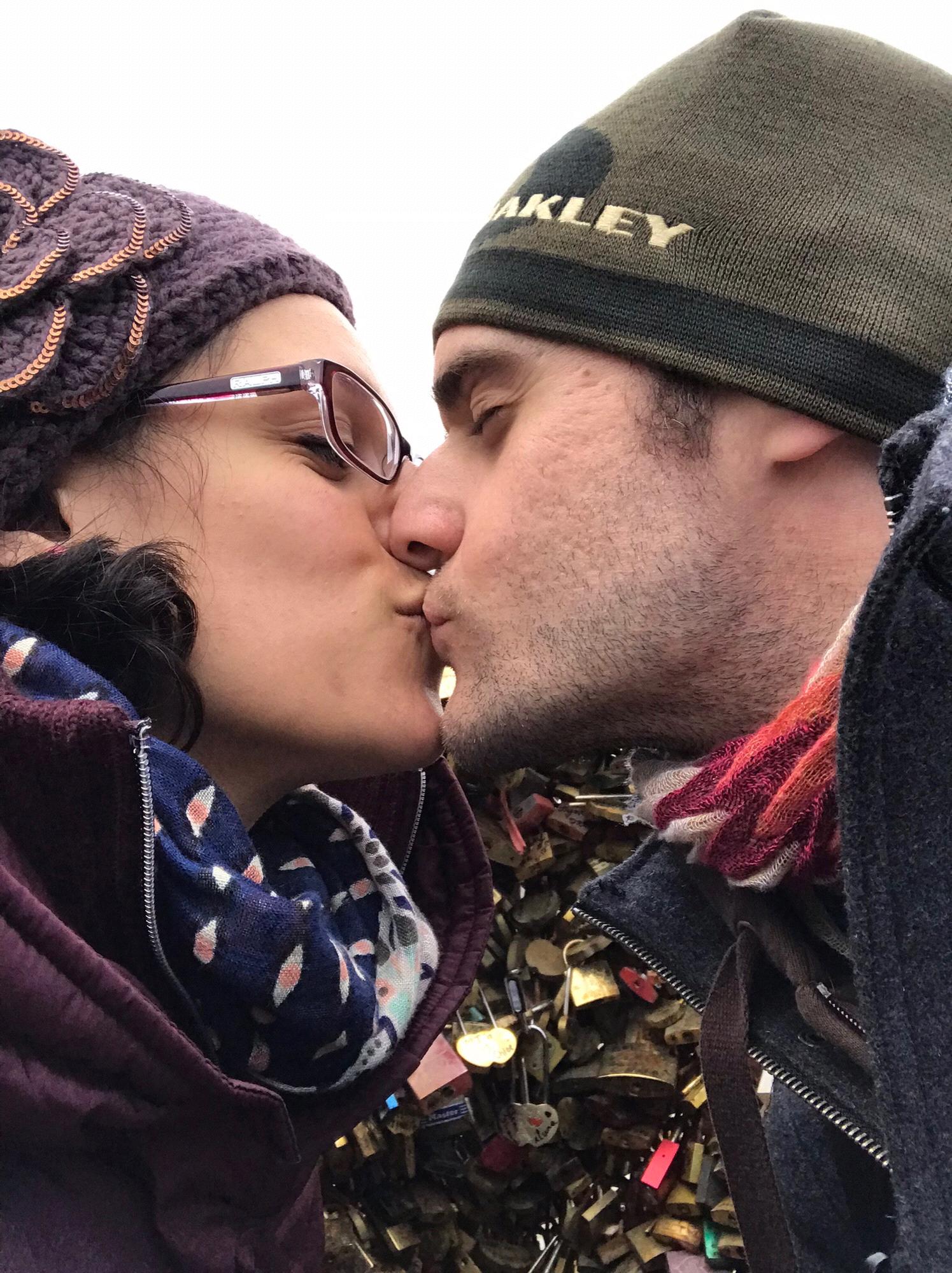 Kissing on the bridge of love locks in Paris!