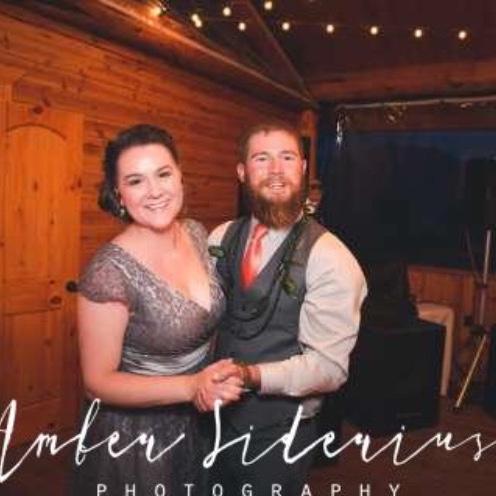 The very first photo ever taken of us the night we met at our friends wedding. At the very same venue we’ll be married 🤍 (sorry for the super blurry pic)