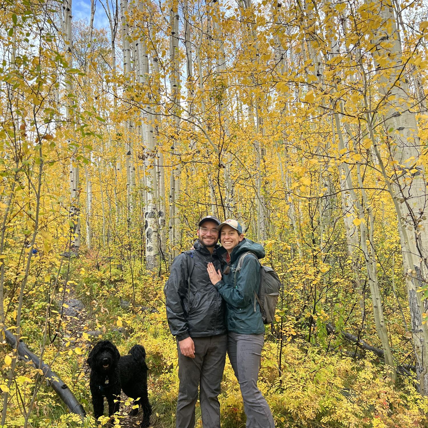 At the end of the hike where Aaron proposed to Emily. Thanks to two hikers we saw on the way out!