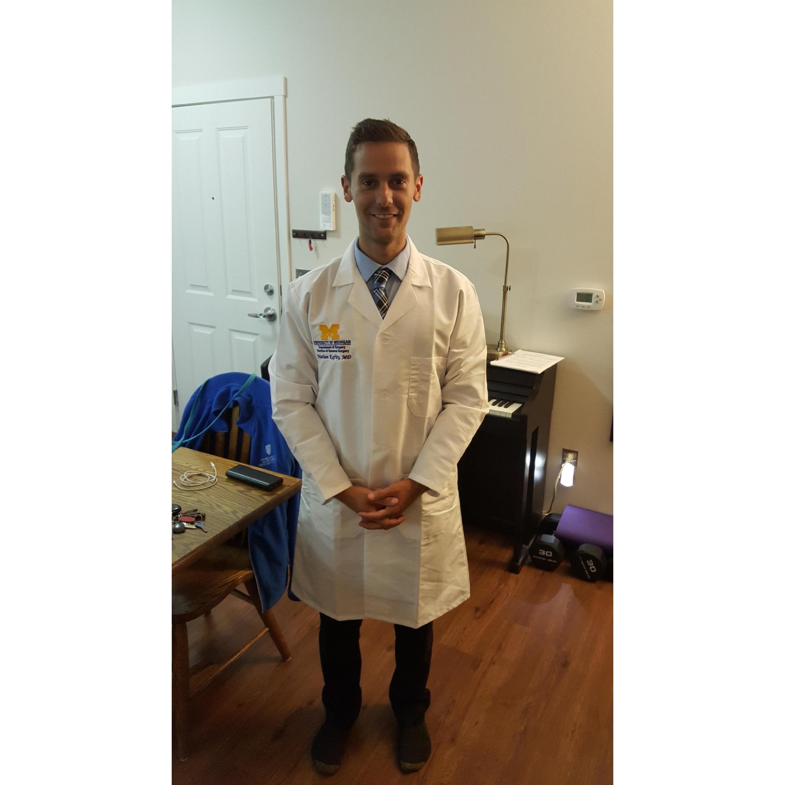 Year 3 - Nathan trying on the long white coat for the first time!