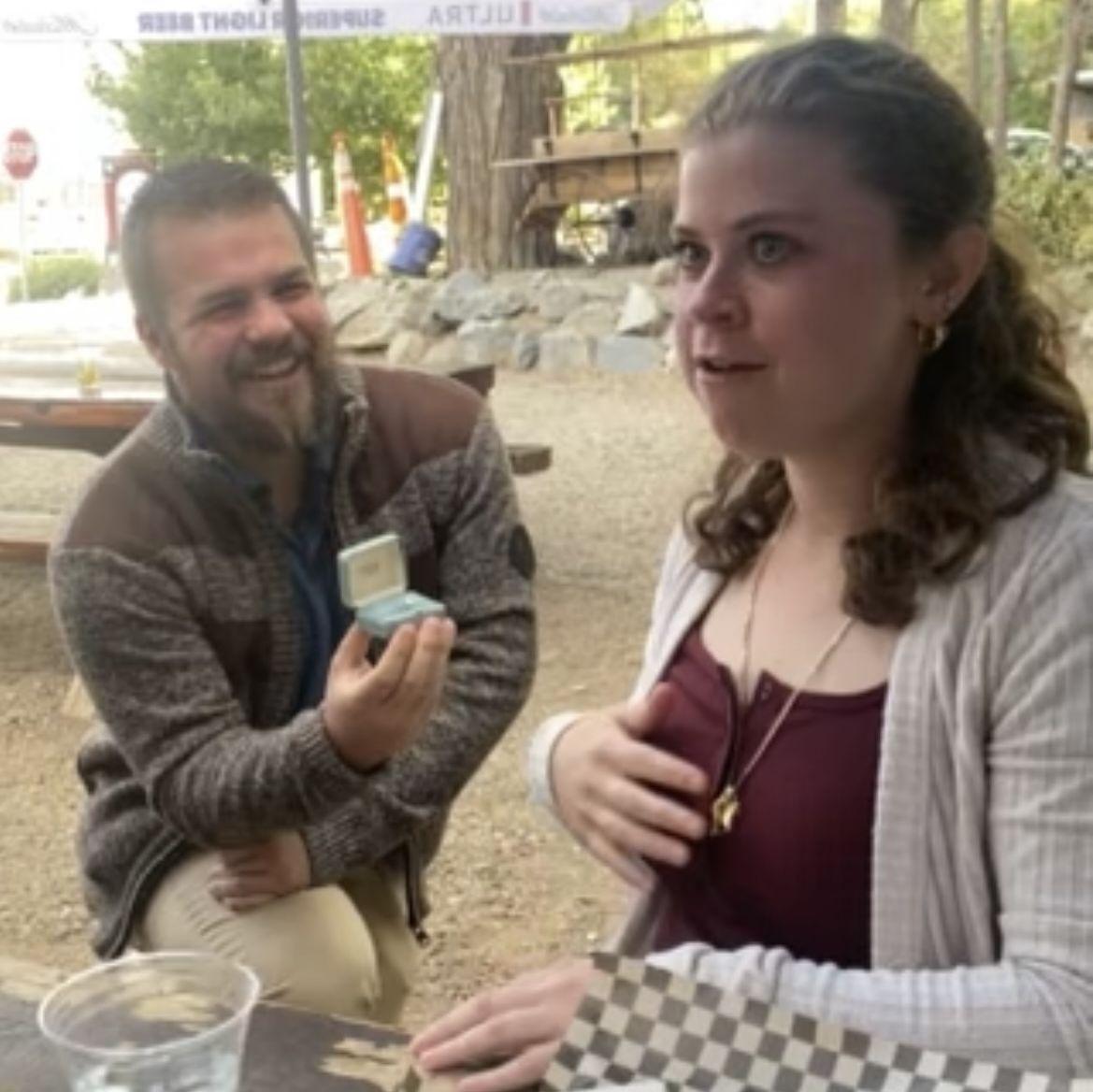 Candace devouring french fries when being asked the biggest question of her life.