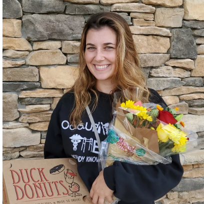 September 2, 2020: Julie passed her OTR exam and officially became an occupational therapist. Jonathan surprised her with some treats after the exam.