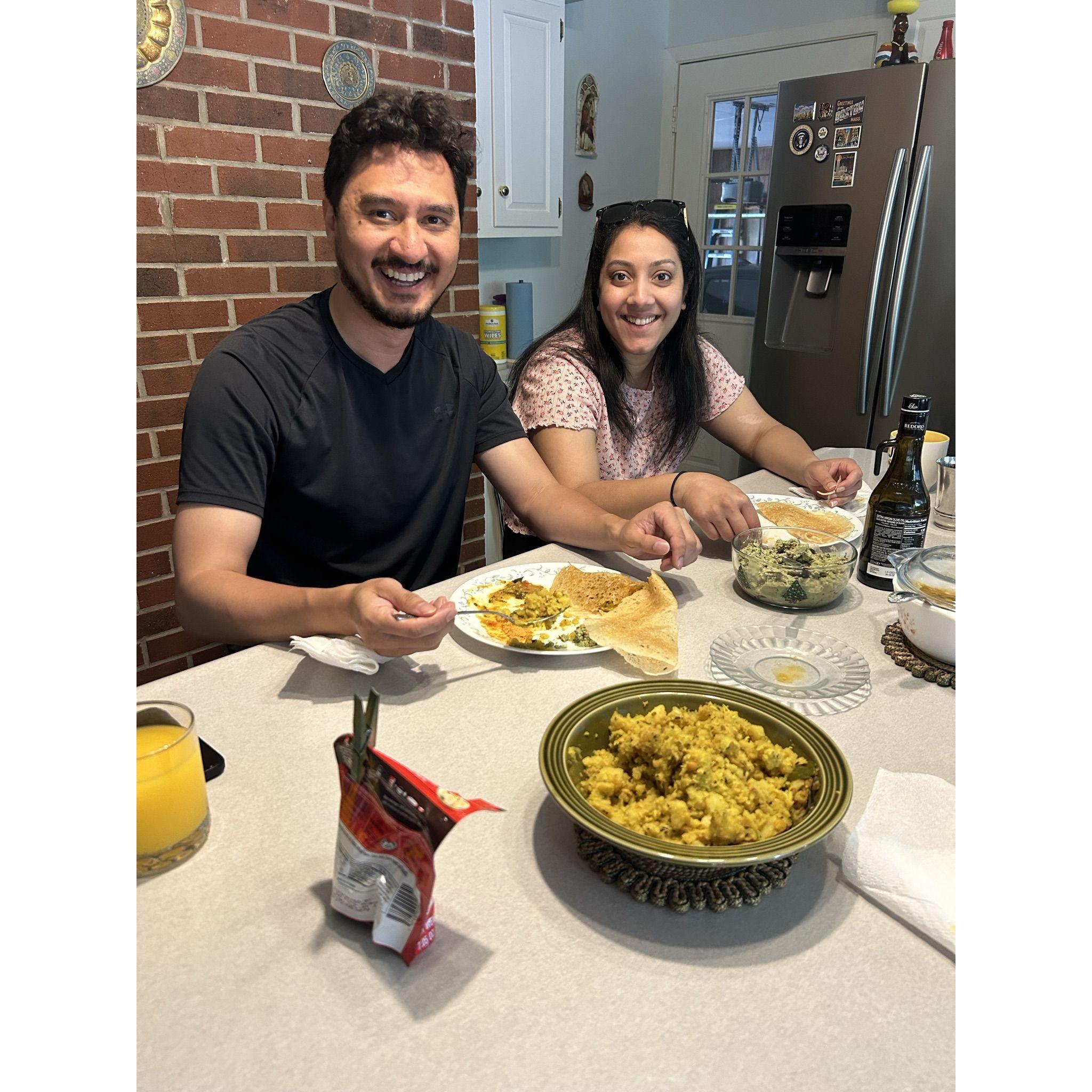 Enjoying some dosa freshly made by Jessica's dad during Micky's first visit to her childhood home in Sikeston, Missouri