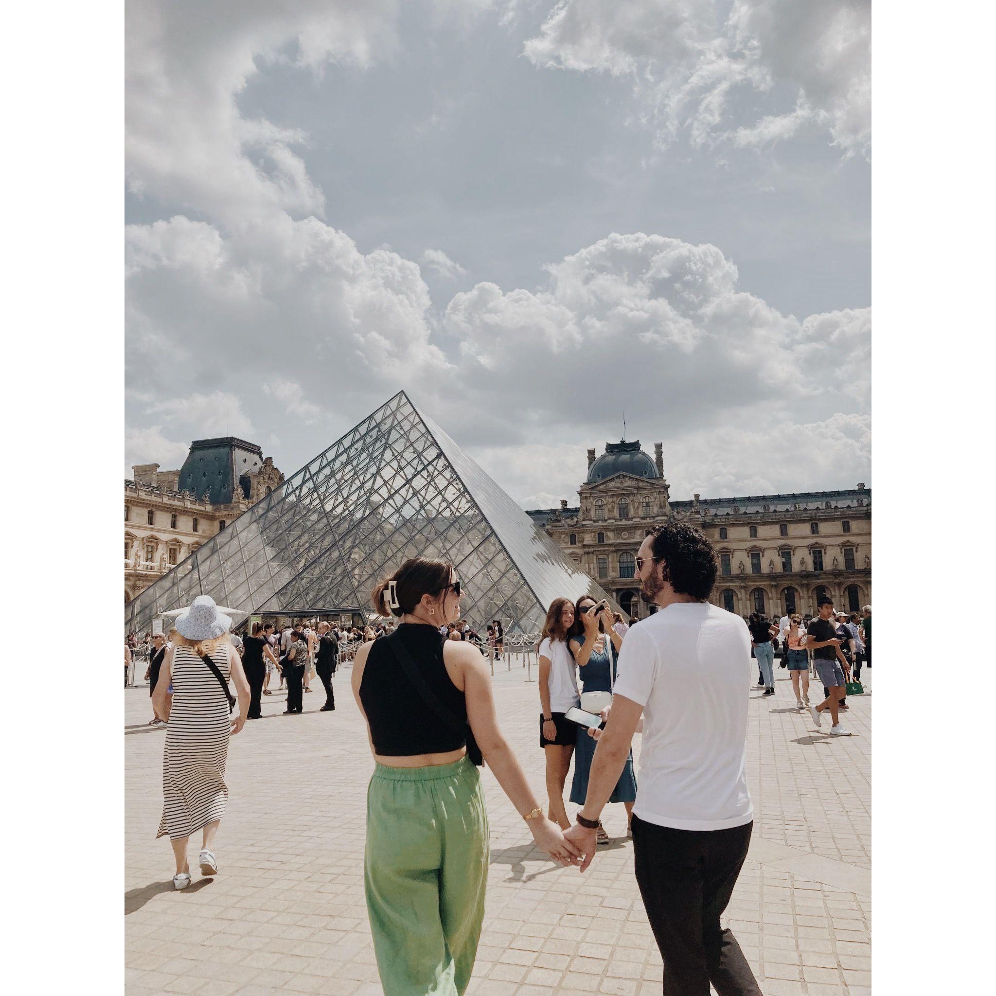 We visited Paris, France in the summer of 2023. This is taken right in front of The Louvre.