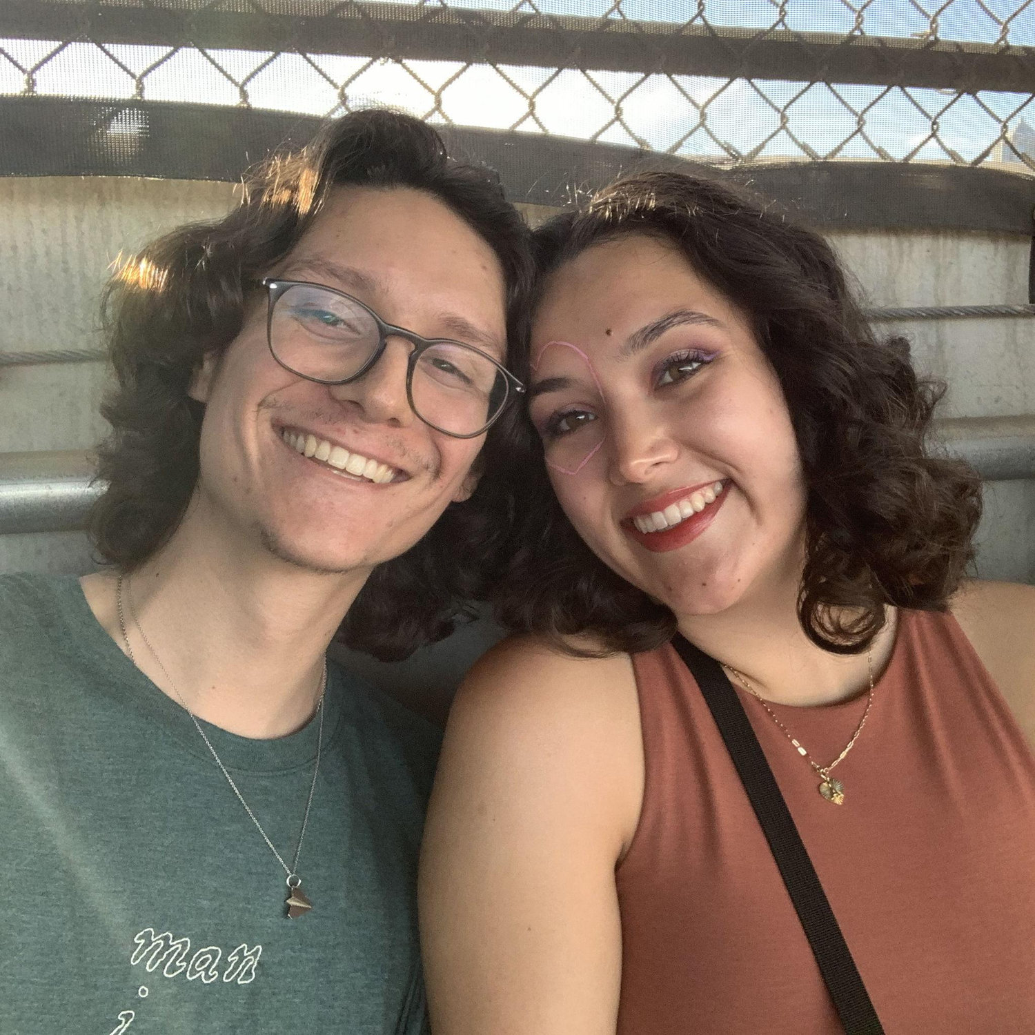 At the Taylor Swift concert in Seattle, Washington! Alexandra embroidered Aidan a shirt that said, "Man I Love Folklore." July 2023