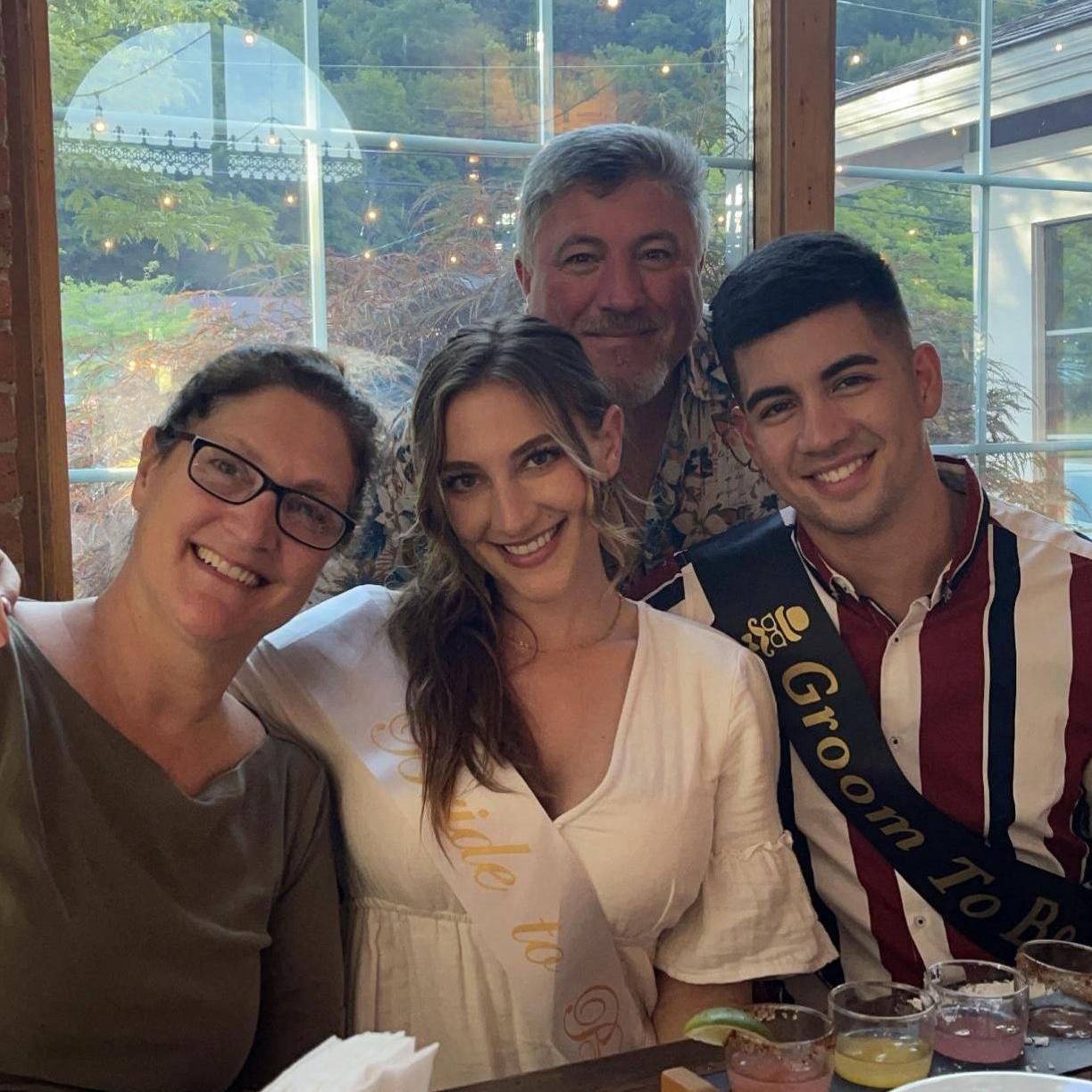 Samantha's parents, Frank and Regina, celebrating our engagement with us!