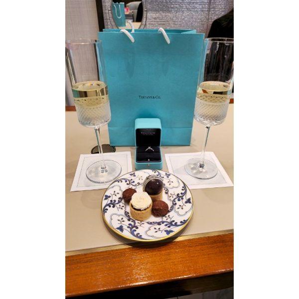 At Tiffany's getting Anne's ring sized.