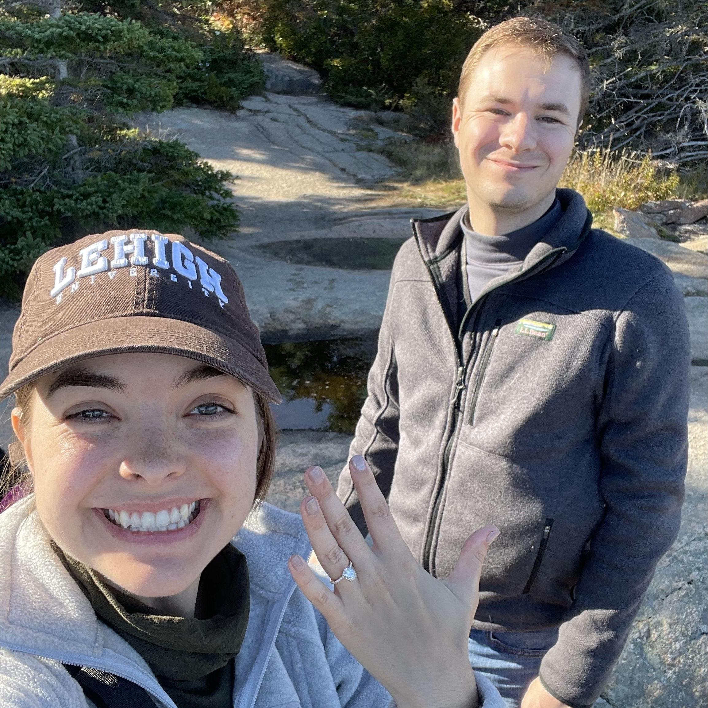 We're engaged! Max proposed in Acadia National Park while we were on a fall foliage road trip through the northeast in 2022.