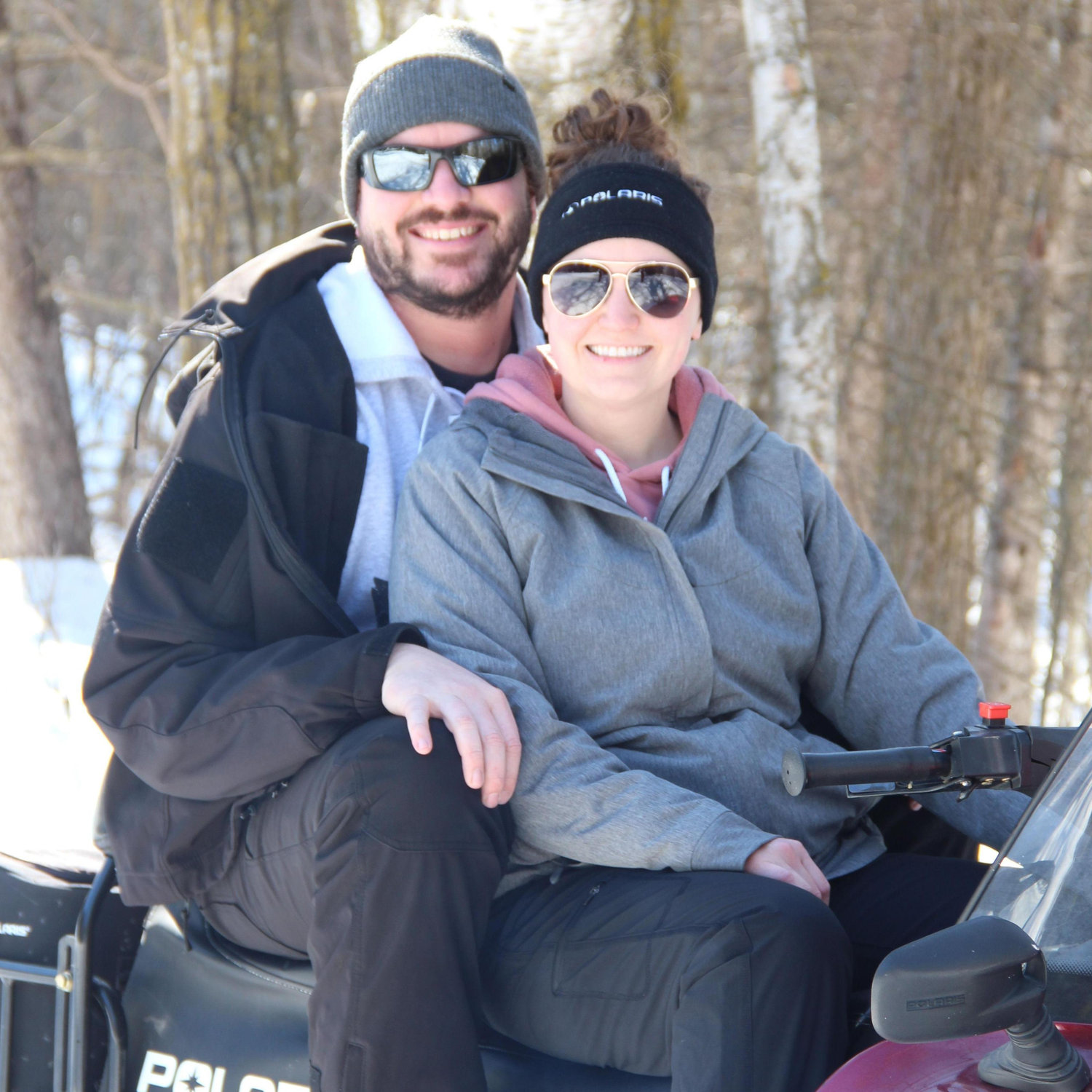 Teaching Chris how to drive a snowmobile