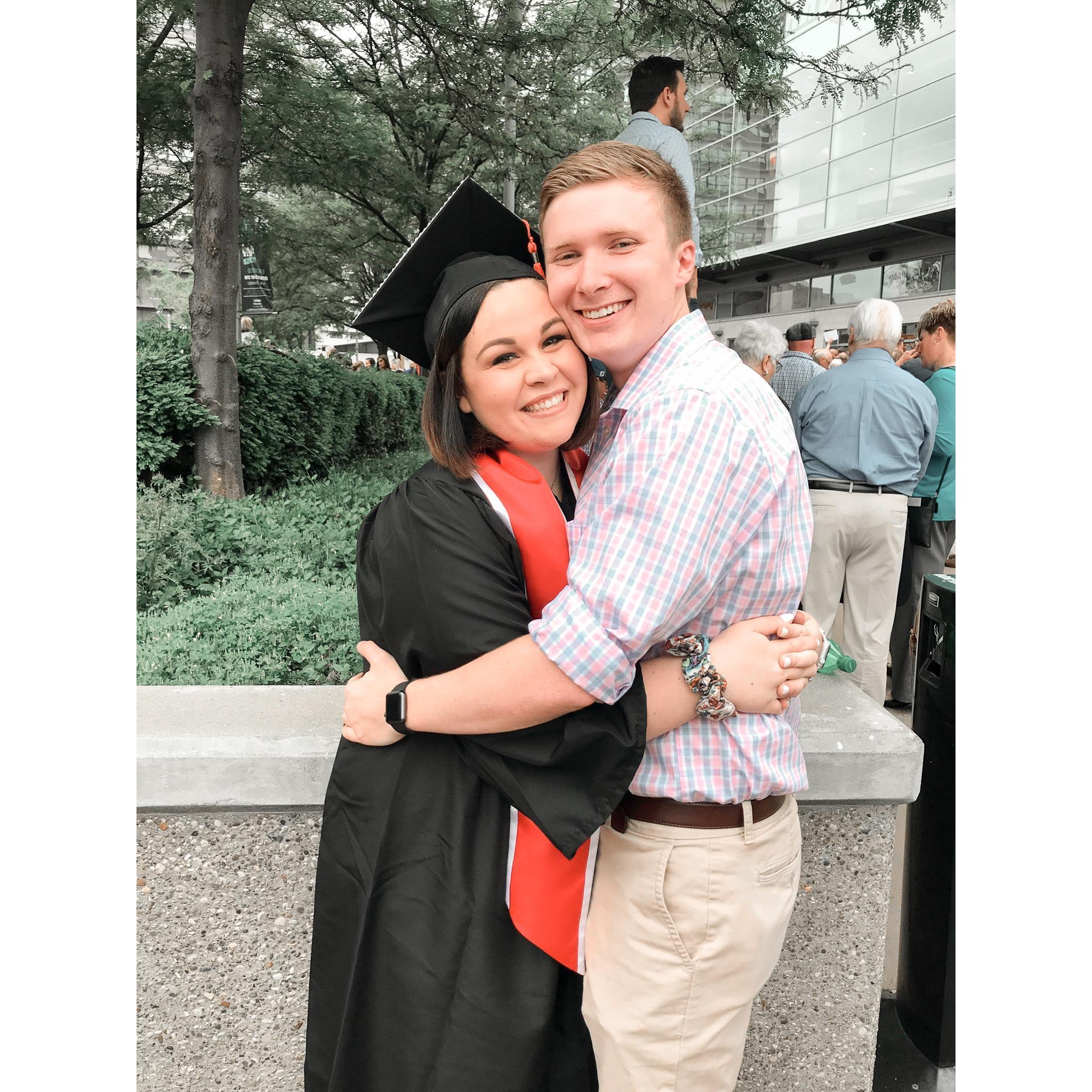 1/2 of us is officially done with school!