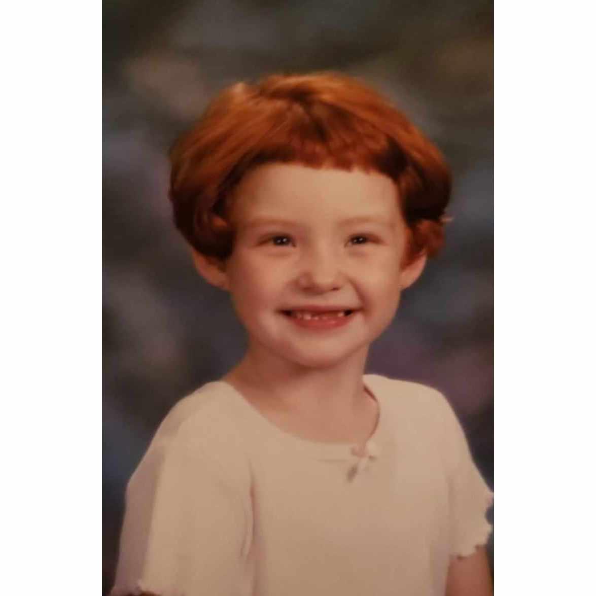 Kylee with the haircut she gave herself in pre-school (which mom did her best to fix)