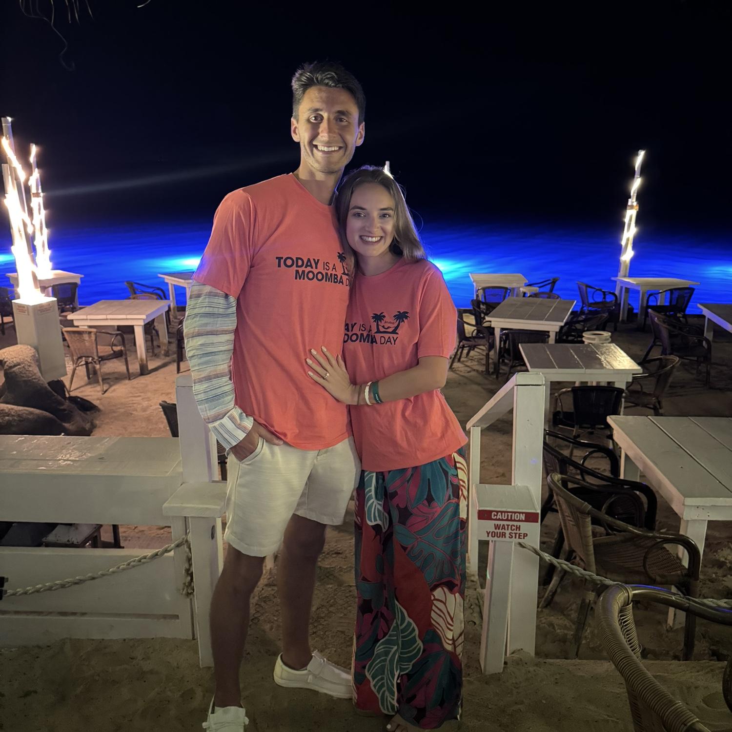 Wearing our moomba shirts!! Which is where we met!