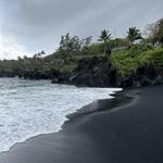 Check out the black sand beach