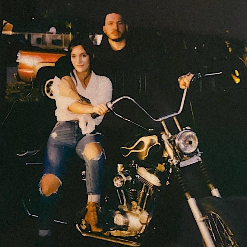 Posed up like something out of Rolling Stone with Evan’s Harley.