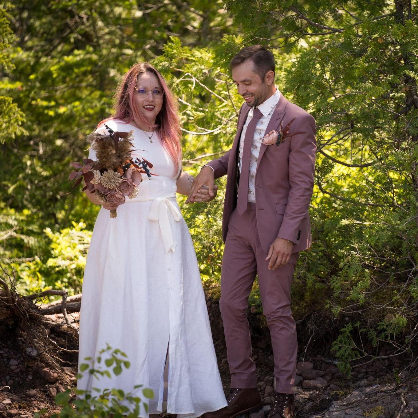 Coming down the aisle together. Chris' mauve suit purchased from Express.
