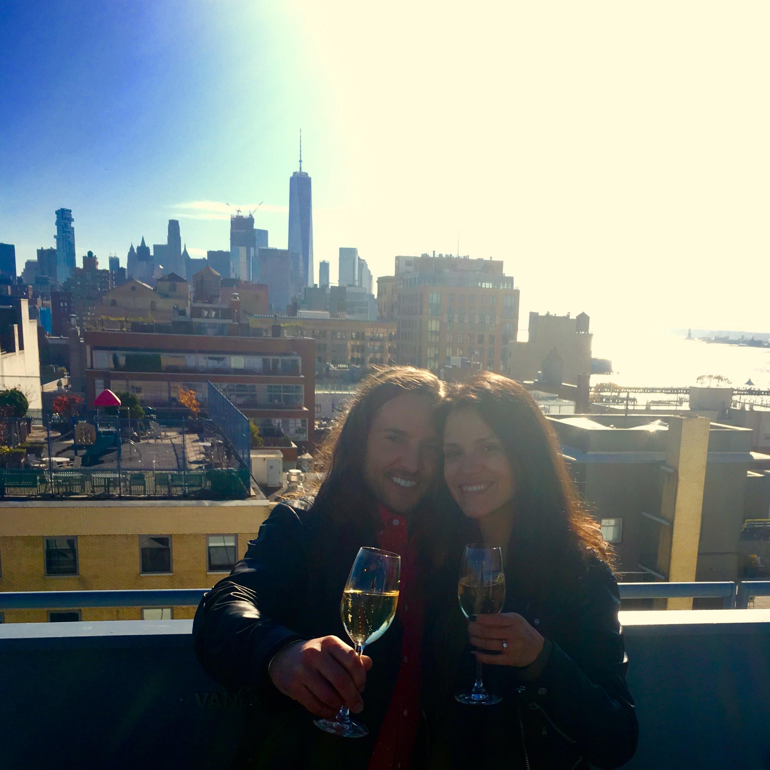 Celebrating our engagement on the Whitney rooftop.
