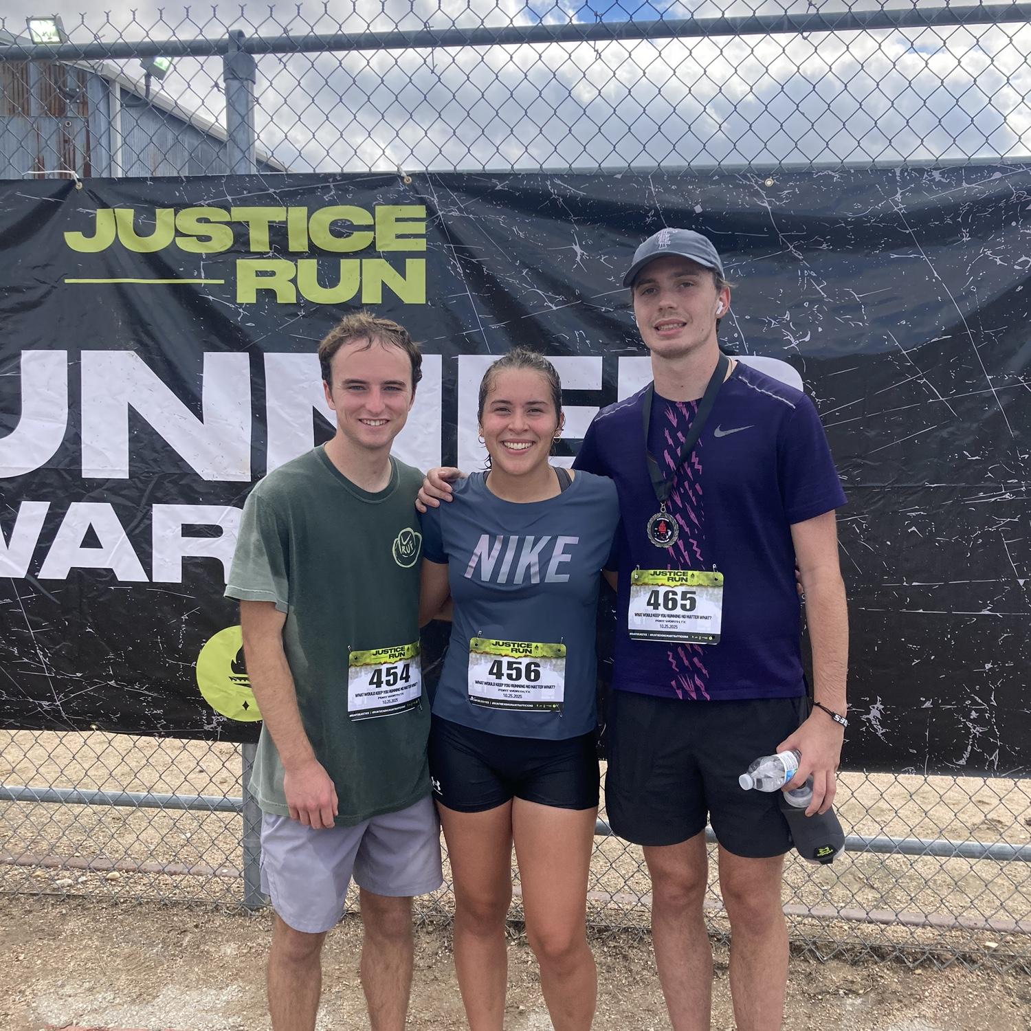 Jack and Esther ran their first marathon the weekend after they got engaged. It was one of the toughest challenges of they've taken on. They can't wait to run another! Photo features running buddy Joe
