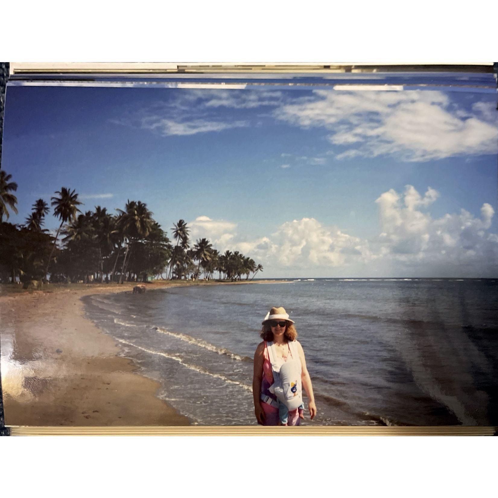 Baby Jessica being toted around on the beach in PR.